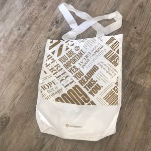 Gold and White Lululemon Bag